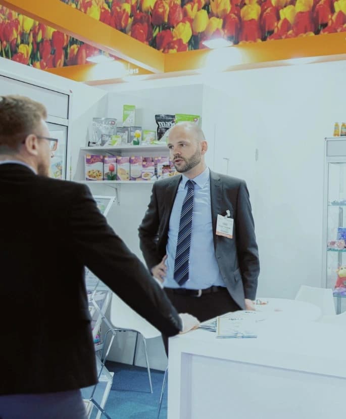 Trigon Food team meeting partners at a trade show